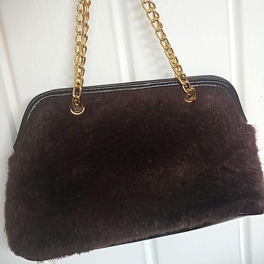 Bolso victoria colo café en buen estado ligeramente usado